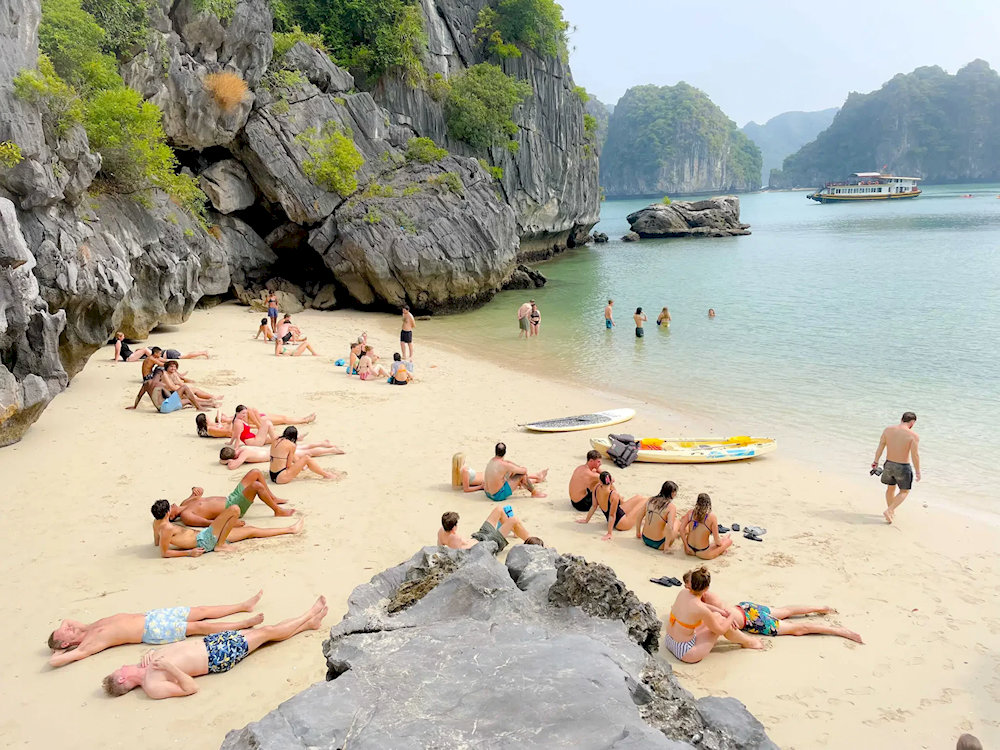 Visitors can swim in the sea or relax on the soft golden sandy beach 